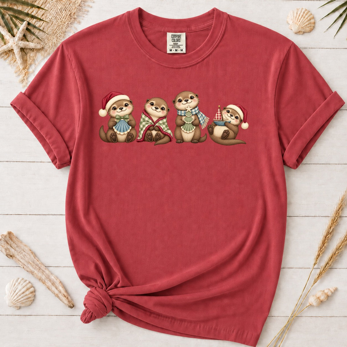 Cute Coastal Christmas Otters Graphic Tee