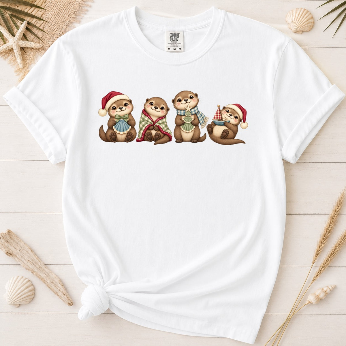 Cute Coastal Christmas Otters Graphic Tee