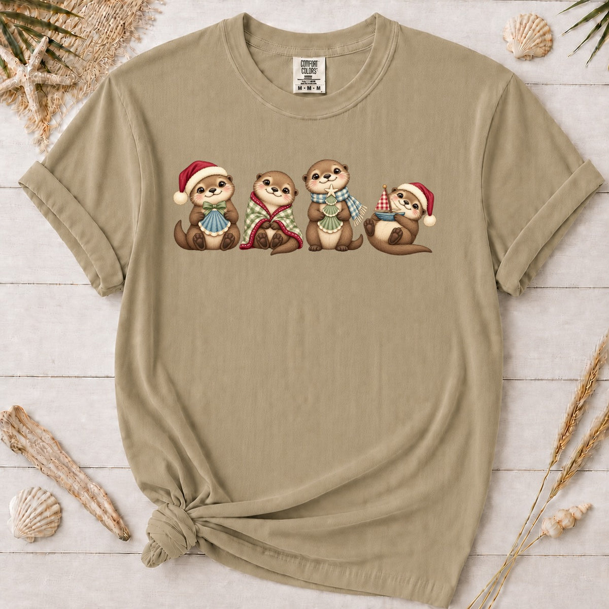 Cute Coastal Christmas Otters Graphic Tee