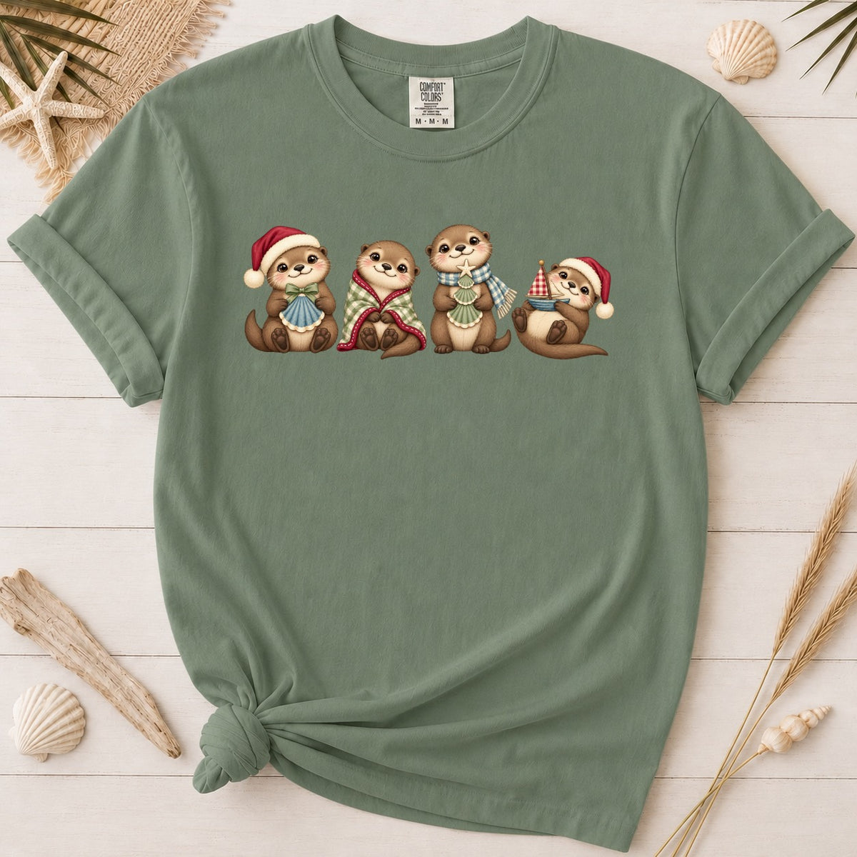 Cute Coastal Christmas Otters Graphic Tee
